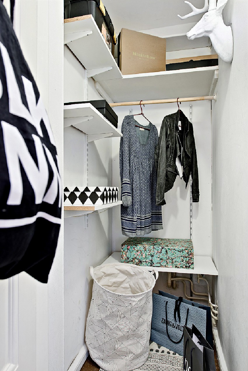 one-room Scandinavian apartment storage area