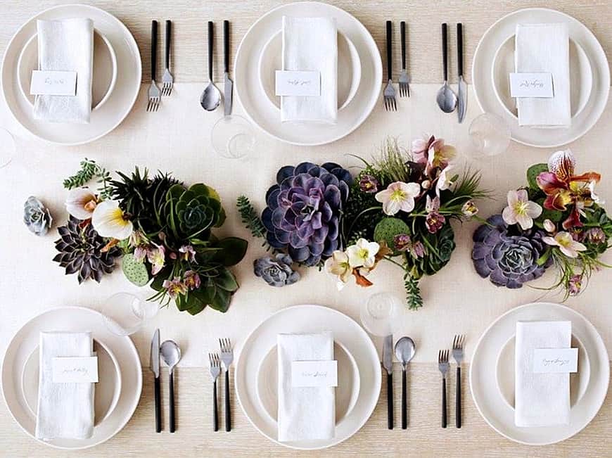 Table setting with succulent centerpieces