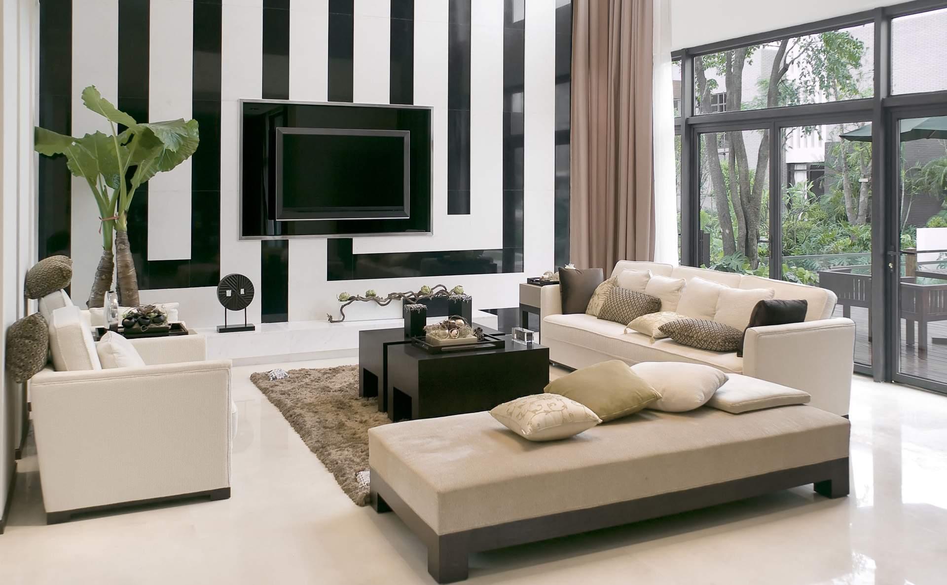 Бежевый, белый и черный цвета в интерьере гостиной в стиле модерн