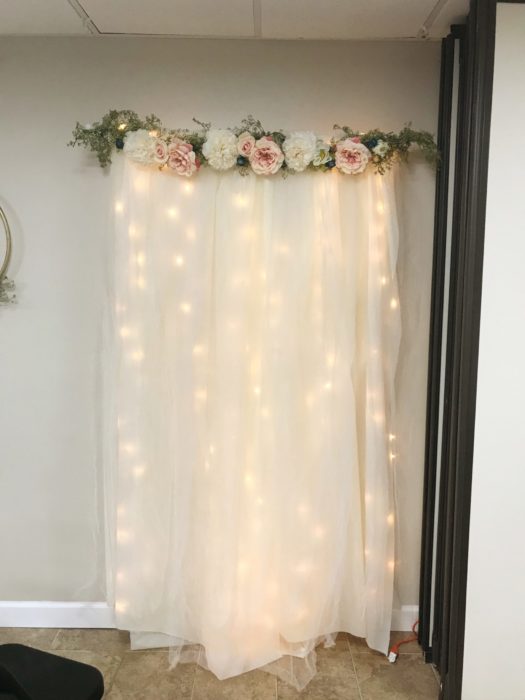 A flowing white curtain in a photo studio