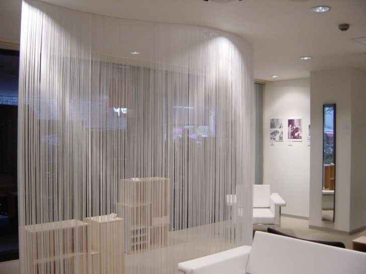 With the help of decorative curtains you can visually expand the space of a room