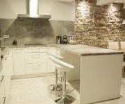 White bar stools and white cabinets – Kitchen High-tech Style