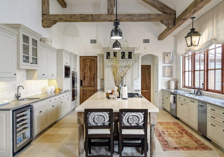Whitewashed ceiling in the country style kitchen