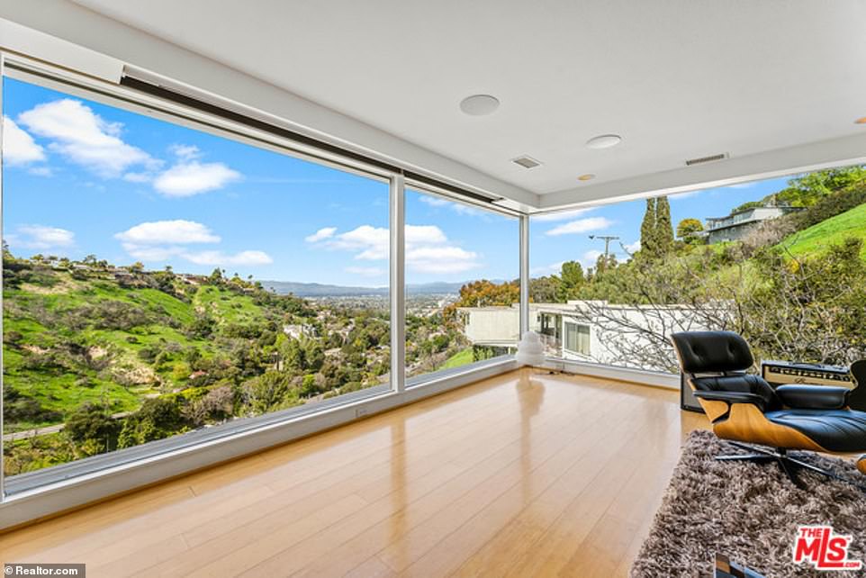 The interior of the home has already been renovated and restored, with updated features like heated floors and fixtures