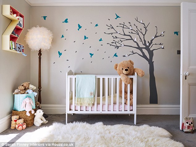 Stimulating: Interior designer Sarah Finney used wall stickers in this stylish nursery