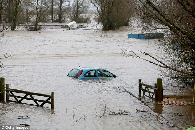 In February cars  were left floating in flood waters near  Somerset during the wettest ever winter for the UK 