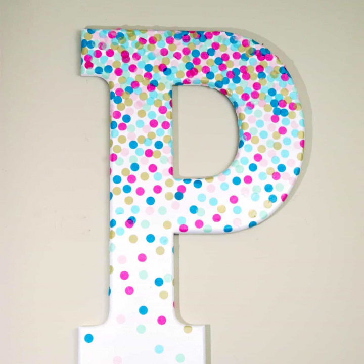 Learn how to make decorative letters using confetti and Mod Podge! This project is perfect for a kids