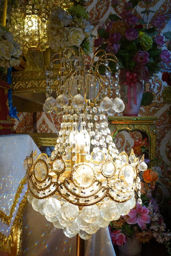 Chandelier with crystal pendants. In temple stock image
