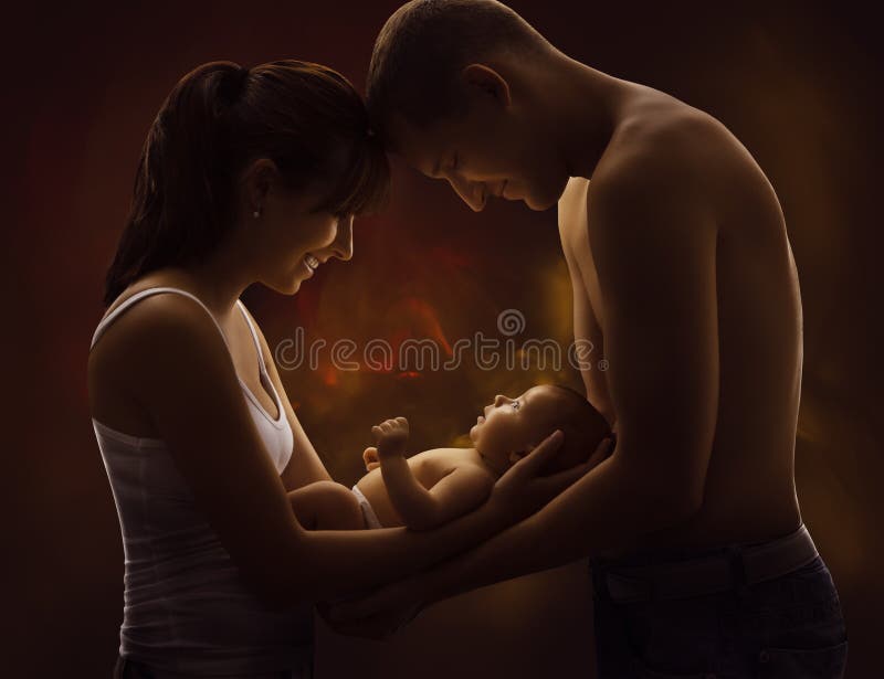 Family Portrait and Baby, Young Mother Father Holding New Born K royalty free stock photos