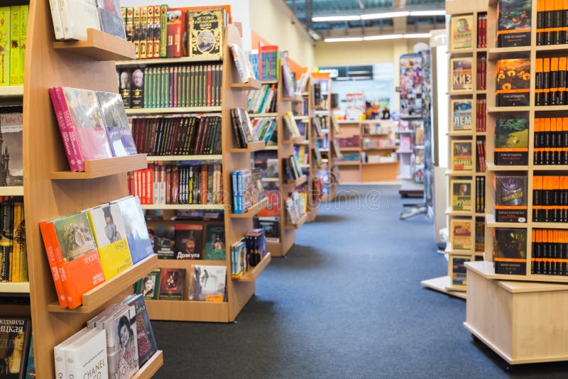 Library book shelves with various books royalty free stock images