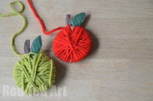 Yarn Wrapped Apple Crafts for Kids - 20 Apple Crafts for Fall - these apple DIY Ideas are just so cute. The kids will love having a go? Will it be apple print wreaths, yarn wrapped apple garlands or this adorable Paper Plate Apple and worm? Great Apple Crafts for Preschoolers to discover and have a go at!