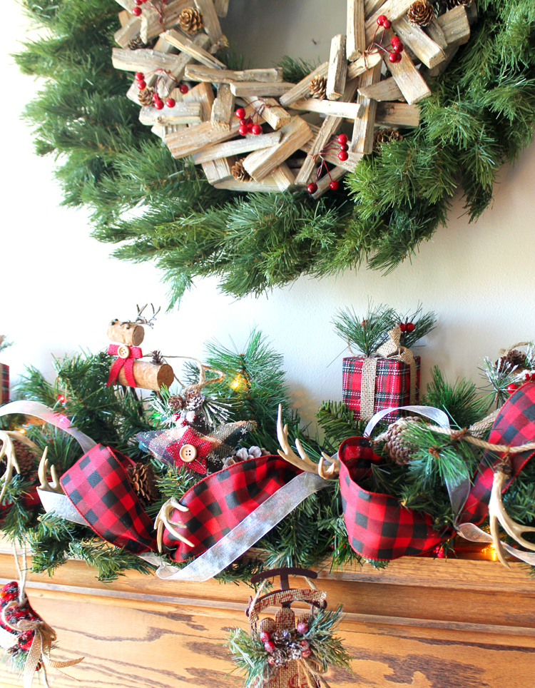 Buffalo check ribbon and rustic ornaments make this Christmas garland feel cozy Christmas Decor Ideas
